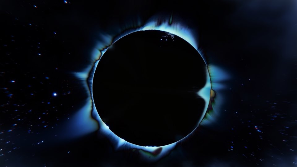 GROUND: a black disc ringed by blue-white light, like a solar eclipse among stars