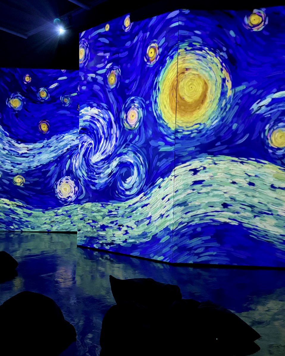 The Starry Night by Van Gogh projected on the walls of the Van Gogh immersive exhibition in Amsterdam