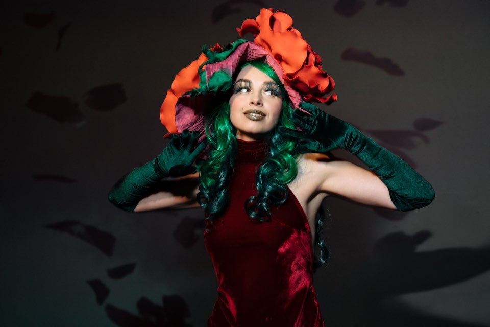 The Rose in a red velvet dress and a flower headdress
